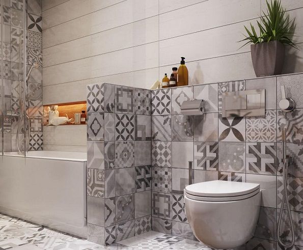 Phòng tắm với tường ốp gạch hoa văn độc đá